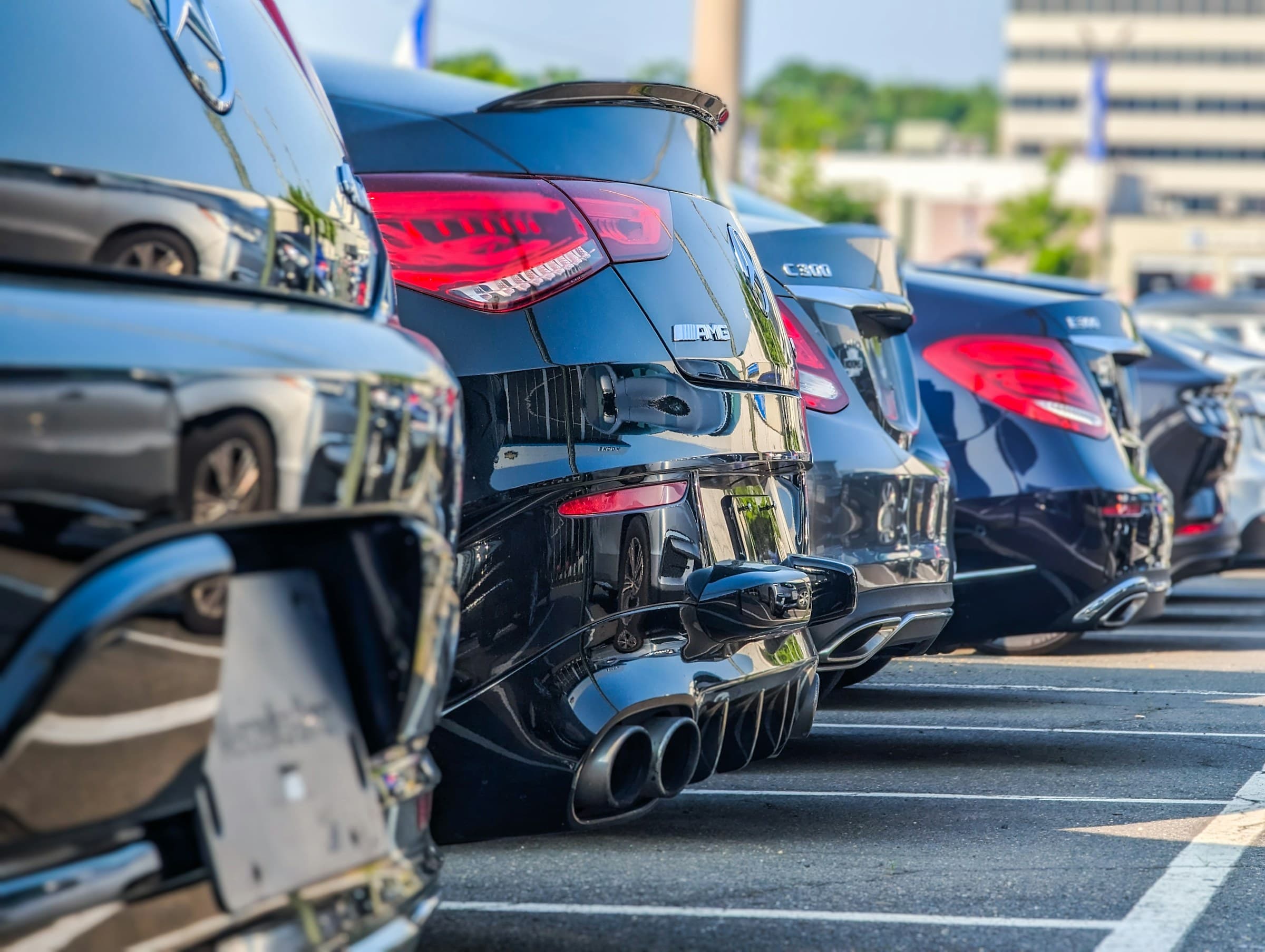 A row of rental cars prepared for customer collection